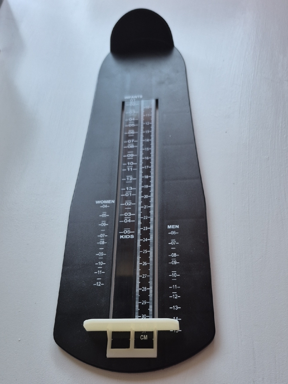 Shoe Sizing Gauge in Black with White Slider